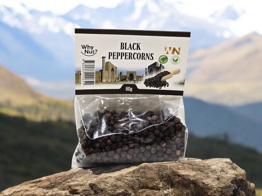 Whole black peppercorns from Nature Pick Market, perfect for enhancing the flavor of your dishes with sharp and spicy notes.